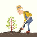 Old man gardener plant a tree