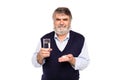 Old man with glass of water and pills in hands Royalty Free Stock Photo