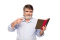 Old man with glasses reading a book Royalty Free Stock Photo