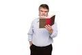 Old man with glasses reading a book Royalty Free Stock Photo