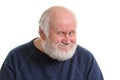 Old man with insidious tricky fake smile, isolated on withe Royalty Free Stock Photo