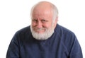 Old man with insidious tricky fake smile, isolated on withe Royalty Free Stock Photo