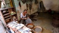 Old Man Making Sieve at Mumbai Street, India