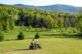 Old Man Mowing Lawn Royalty Free Stock Photo