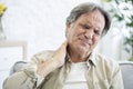 Old man with neck pain Royalty Free Stock Photo
