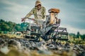 Old man operate tractor at ricefield in canggu badung bali