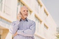 old man phones with a mobile phone Royalty Free Stock Photo