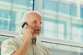 old man phones with a mobile phone Royalty Free Stock Photo