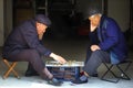 Old man play Chinese Chess