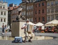 Old man playing accordion in Warsaw.