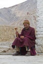 The old man with the prayer wheel