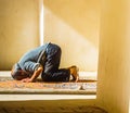 Old man is praying in mosque in Iran Royalty Free Stock Photo