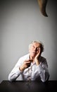 Old man is praying with rosary beads. Prayer and temptation. Royalty Free Stock Photo