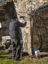 Old man pruning Royalty Free Stock Photo