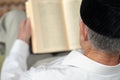 An old man reading the book. Selective focus Royalty Free Stock Photo