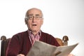 Old man reading newspapper