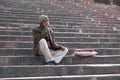 Old man relaxing at Jama Masjid Mosque, Delhi Royalty Free Stock Photo