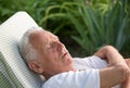 Old man resting in garden Royalty Free Stock Photo