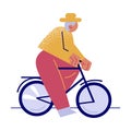 Old man riding bicycle in green city with good ecological situation Royalty Free Stock Photo