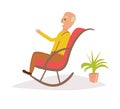 Old man rocking in a rocking chair. Royalty Free Stock Photo