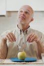 Old man's diet battle: apple versus cravings