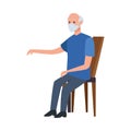 Old man seated in wooden chair