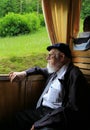 The old man in the sightseeing train,the alps,switzerland