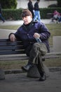 Old man sitting on a bench
