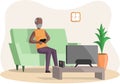 Old man sitting on couch plays video games on tv. Senior person with gamepad playing on console Royalty Free Stock Photo