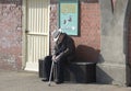 Old man sleeping on bench. Brighton. England