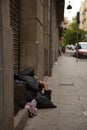 An old man is sleeping on a doorway. Royalty Free Stock Photo