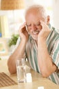 Old man suffering from headache Royalty Free Stock Photo