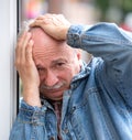 Old man suffering from a headache Royalty Free Stock Photo