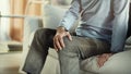 Old man suffering from knee pain Royalty Free Stock Photo
