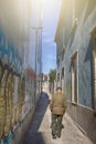 Old Man in Suit Having A Walk on The Empty Street in Porto, Portugal