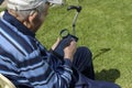 Old Man Tablet Magnifying glass Reading