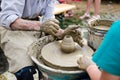 Old man teaching pottery Royalty Free Stock Photo