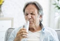 Old man with tooth sensitivity Royalty Free Stock Photo