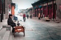 Old man with a tricycle in a street of Pingyao, China. Royalty Free Stock Photo