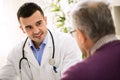 Old man visit doctor, patient care Royalty Free Stock Photo