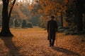 Old Man Walking in Autumn Park Royalty Free Stock Photo