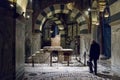 Old man walking to the Karlsthron Throne of Charlemagne inside of the Chapel of Charlemagne Aachen Cathedral