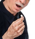 Old man wants to take a pill Royalty Free Stock Photo