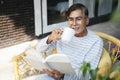 Old man wearing eyeglasses Great book Royalty Free Stock Photo