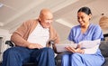 Old man, wheelchair or caregiver reading documents, history or healthcare documents at nursing home. Smile, medical Royalty Free Stock Photo