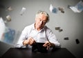 Old man in white and empty wallet. Accounting and taxes. Royalty Free Stock Photo