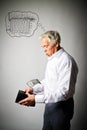 Old man in white and empty wallet. Heating season, one dollar, heavy expenses, taxes and accounting concept Royalty Free Stock Photo