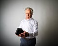 Old man in white and empty wallet. Royalty Free Stock Photo