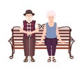 Old man and woman or grandparents sitting on bench. Portrait of elderly romantic couple relaxing outdoors. Male and