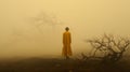 Yellow Cloak In Surreal Field: An Otherworldly Scene